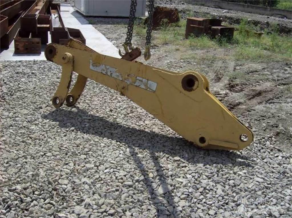 CAT 212 Šasija un piekare
