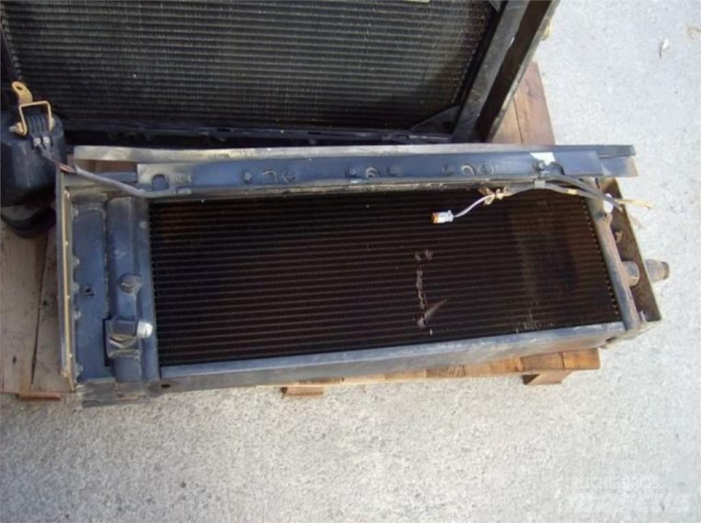 CAT 5080 Sliedes, ķēdes un šasija