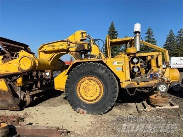 CAT 633 Skrēperi