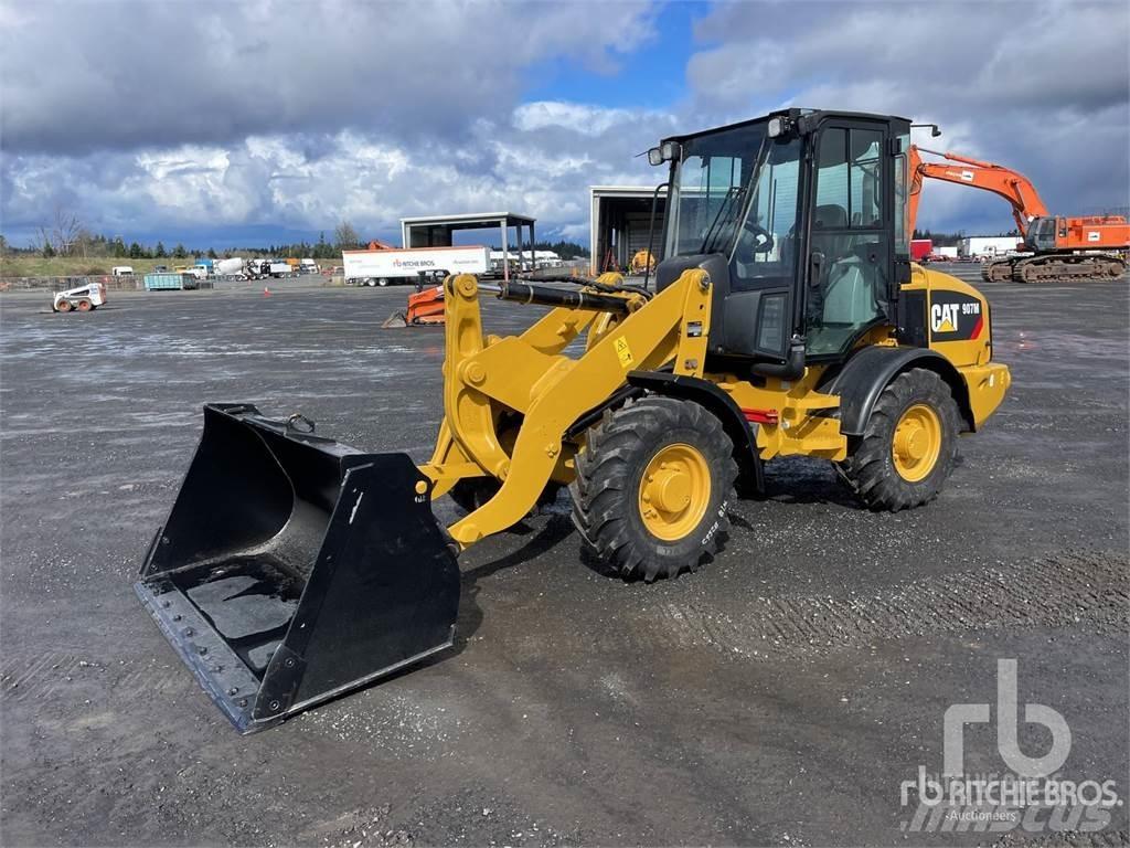 CAT 907M Iekrāvēji uz riteņiem