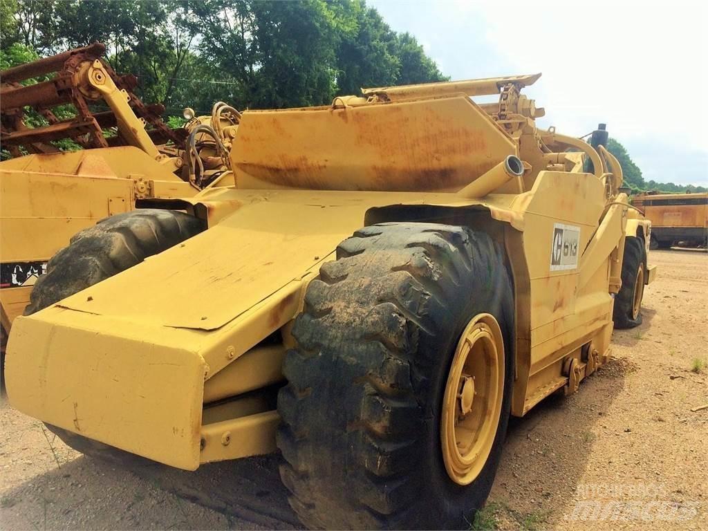 CAT 613 Skrēperi