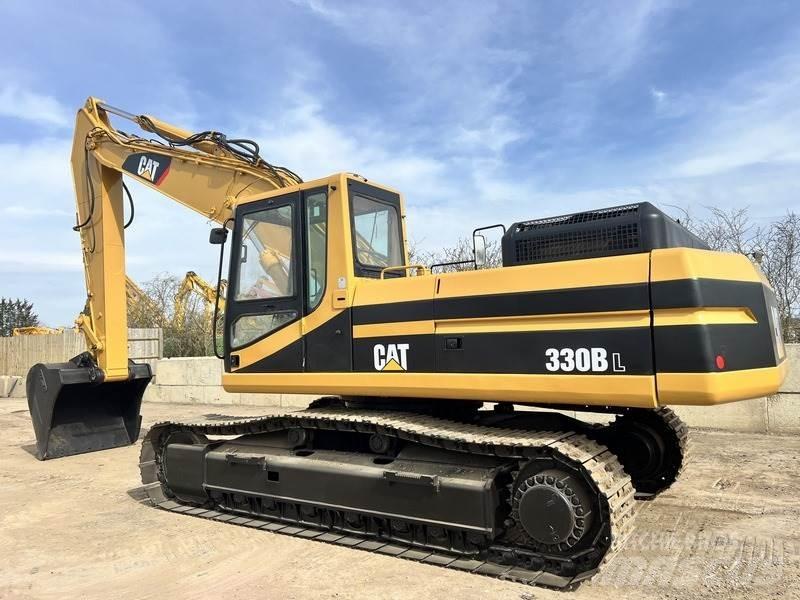 CAT 330. Kāpurķēžu ekskavatori