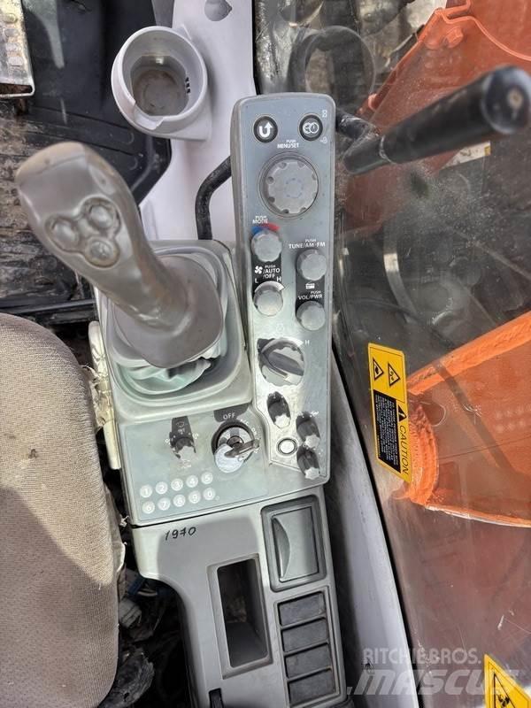 Hitachi ZX85US-5A Ekskavatori tālās sniedzamības darbiem