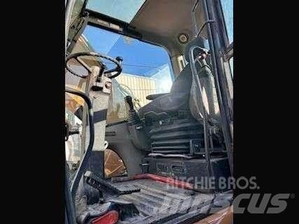 CASE WX210 Ekskavatori uz riteņiem
