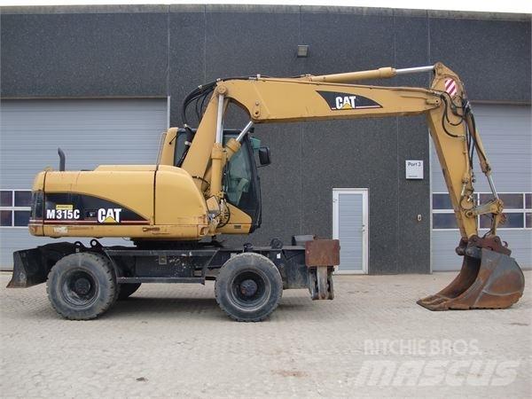 CAT M315C Ekskavatori uz riteņiem
