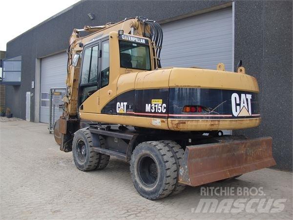 CAT M315C Ekskavatori uz riteņiem