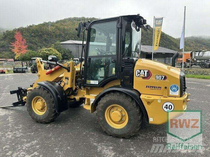 CAT 907 Iekrāvēji uz riteņiem