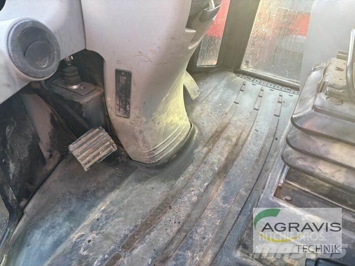 CAT 908 Iekrāvēji uz riteņiem