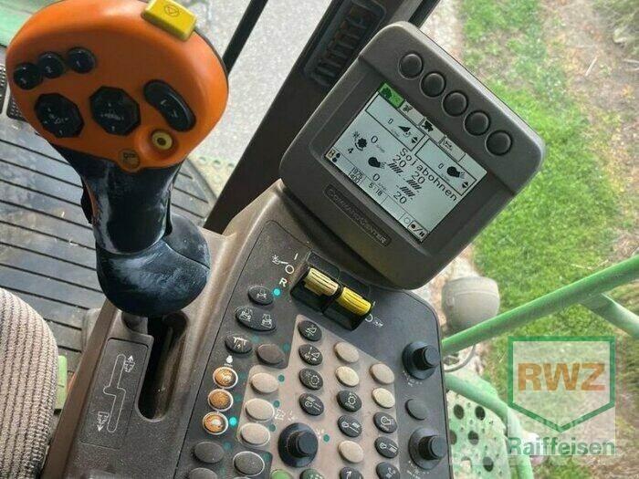John Deere T560 Ražas novākšanas kombaini