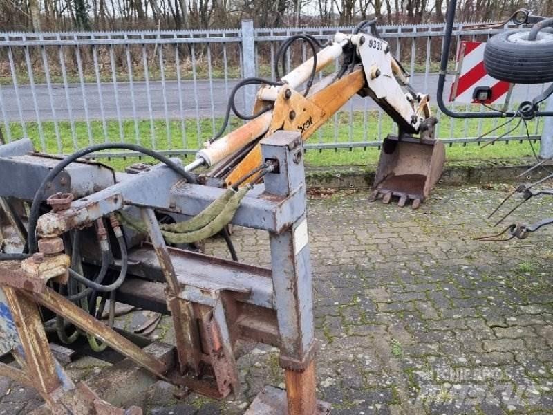  Bagger Ekskavatori uz riteņiem