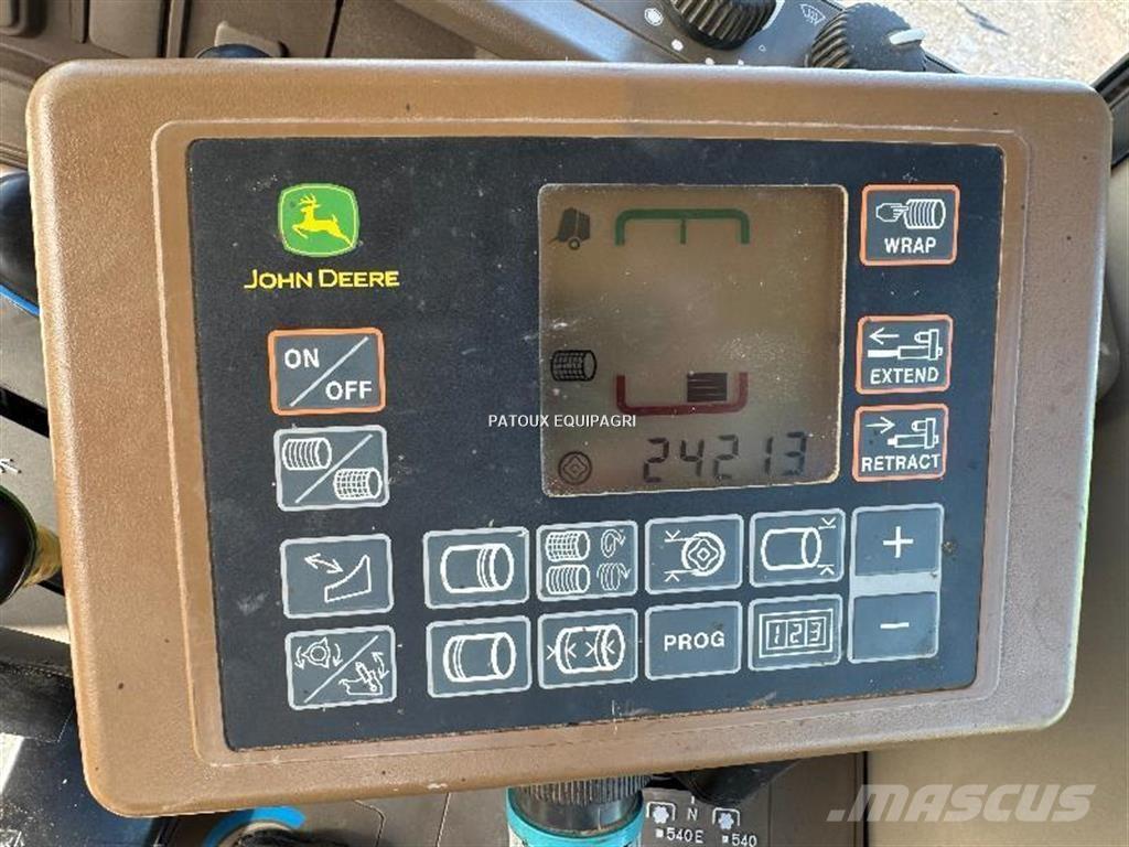 John Deere 864 Rituļu preses