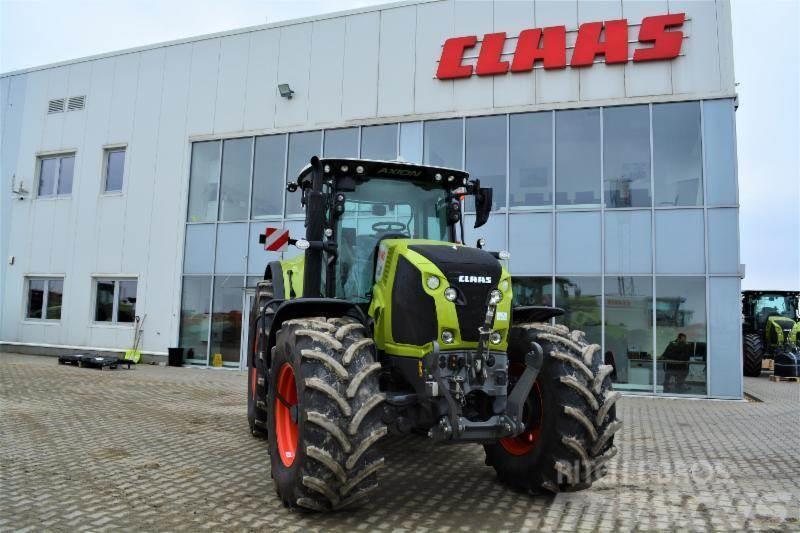 CLAAS AXION 810 Traktori